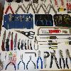 assorted tools, assorted pocket knives, alan wrench, c- clamp