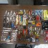 assorted tools, letter opener, pocket knives, nails, nailclippers, swiss knives,