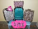 assorted suitcases, pink tote bag