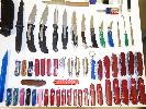 assorted swiss pocket knives, misc. tools