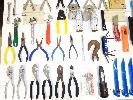 assorted pliers, long nose pliers, wrenches