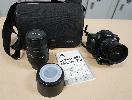 Minolta maxxum 70 35mm film camera, sigma camera lens and lens hood, camera bag.