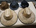 straw hats and fedora style hats